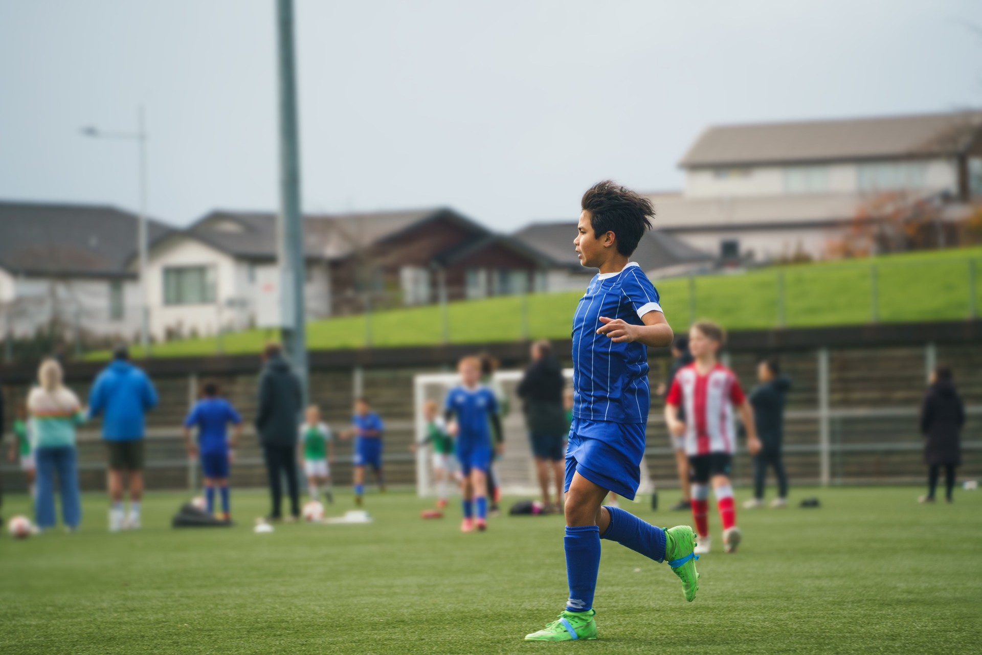 Soccer players playing a competitive match.